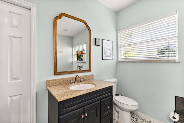 2623 Gables Dr, Eustis, FL 32726 - bathroom with vanity, toilet, and baseboards