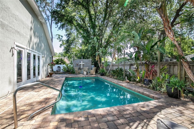 2623 Gables Dr, Eustis, FL 32726 - view of pool featuring a patio, a fenced backyard, and french doors