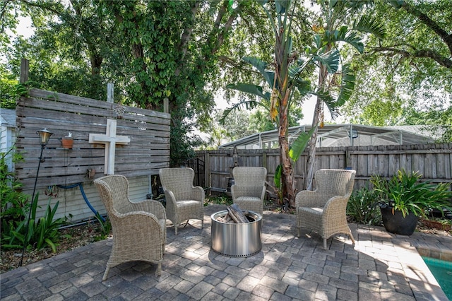 2623 Gables Dr, Eustis, FL 32726 - fenced backyard with a patio area and a fire pit