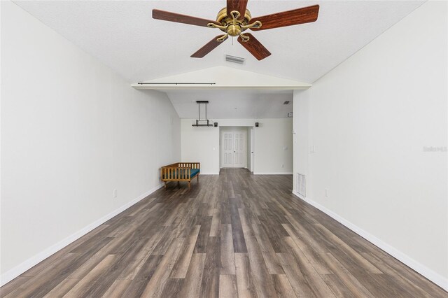 520 Via Verona Ln Unit 202, Altamonte Springs, FL 32714 - unfurnished living room with dark wood-type flooring, ceiling fan, lofted ceiling, and baseboards
