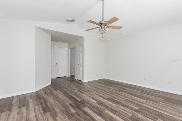 520 Via Verona Ln Unit 202, Altamonte Springs, FL 32714 - empty room with ceiling fan, dark wood-type flooring, lofted ceiling, and baseboards