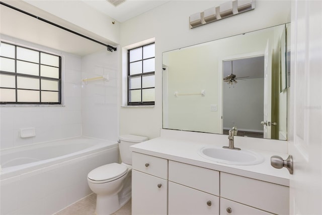 520 Via Verona Ln Unit 202, Altamonte Springs, FL 32714 - full bath with toilet, vanity, a ceiling fan, tile patterned flooring, and shower / bath combination