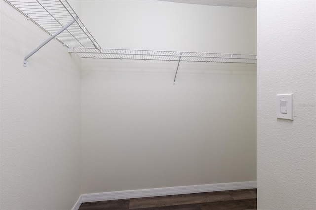 520 Via Verona Ln Unit 202, Altamonte Springs, FL 32714 - spacious closet featuring dark wood-style floors