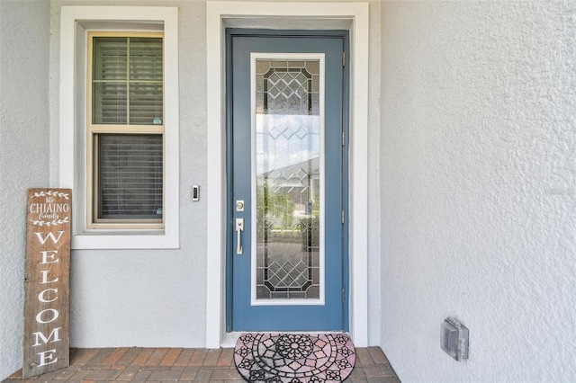 31840 Magna Gulf Loop, San Antonio, FL 33576 - entrance to property featuring stucco siding