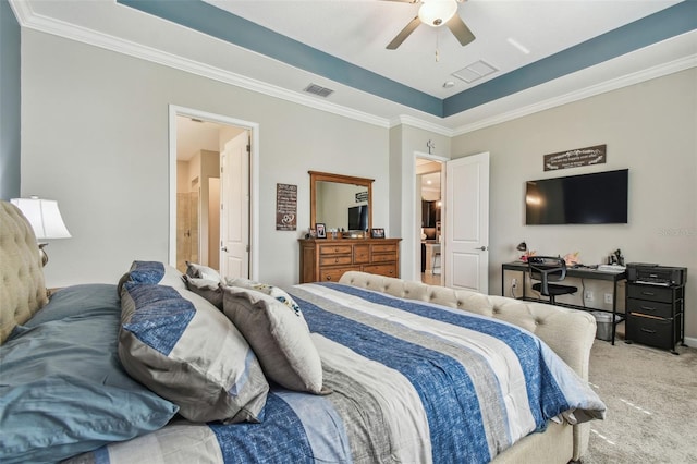 31840 Magna Gulf Loop, San Antonio, FL 33576 - bedroom with a raised ceiling, light colored carpet, ornamental molding, ceiling fan, and ensuite bathroom