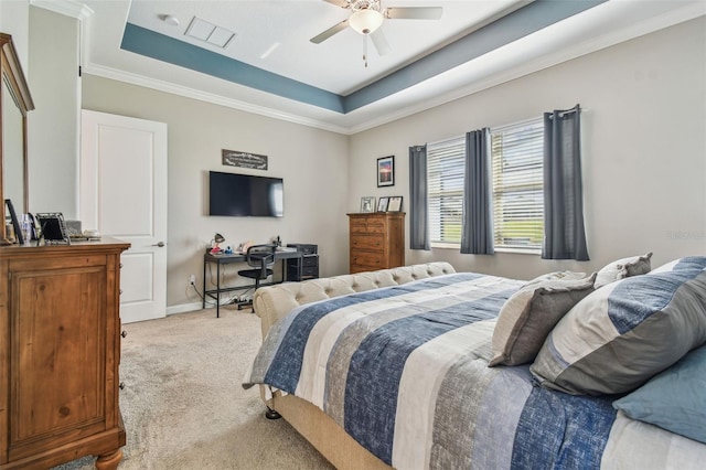 31840 Magna Gulf Loop, San Antonio, FL 33576 - bedroom featuring carpet flooring, a raised ceiling, crown molding, a ceiling fan, and baseboards