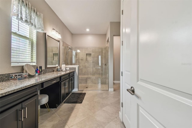 31840 Magna Gulf Loop, San Antonio, FL 33576 - full bath featuring tiled shower, vanity, and tile patterned floors