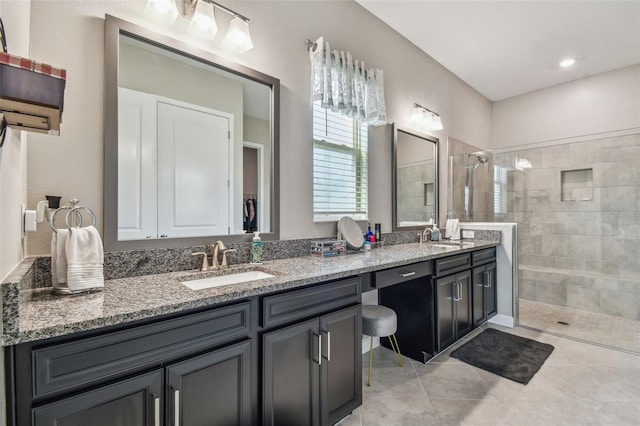 31840 Magna Gulf Loop, San Antonio, FL 33576 - full bath with a walk in shower, double vanity, and tile patterned floors
