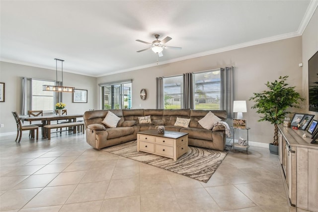 31840 Magna Gulf Loop, San Antonio, FL 33576 - living room with ornamental molding, a ceiling fan, light tile patterned flooring, and baseboards