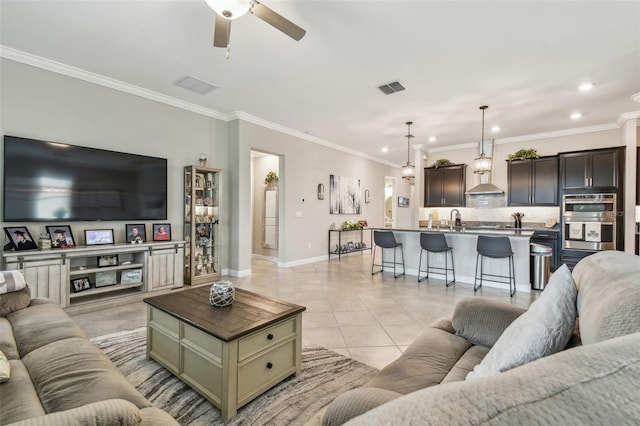 31840 Magna Gulf Loop, San Antonio, FL 33576 - living room featuring ceiling fan, ornamental molding, light tile patterned floors, baseboards, and recessed lighting