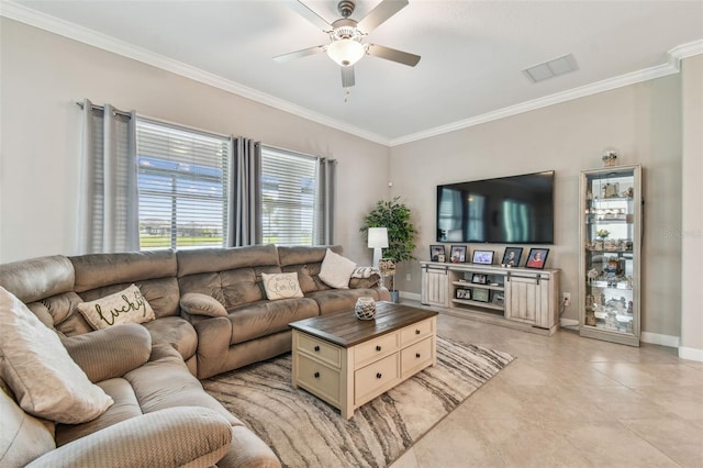 31840 Magna Gulf Loop, San Antonio, FL 33576 - living room featuring ornamental molding, baseboards, ceiling fan, and light tile patterned floors