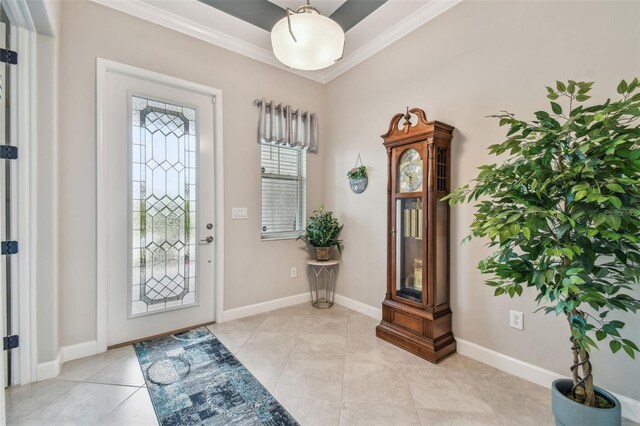 31840 Magna Gulf Loop, San Antonio, FL 33576 - entrance foyer with ornamental molding, light tile patterned floors, and baseboards
