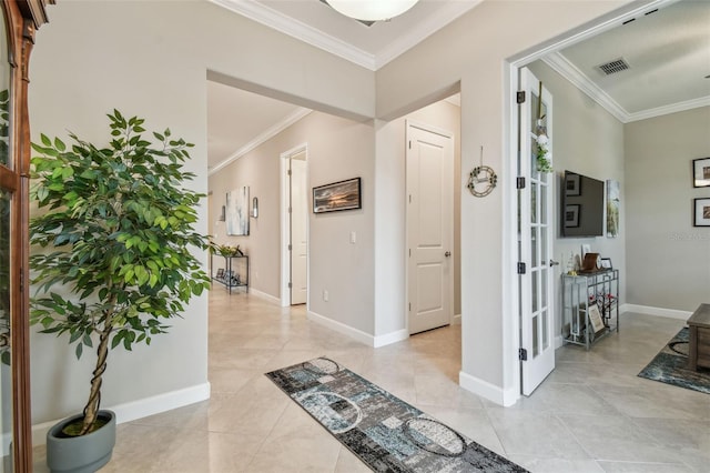31840 Magna Gulf Loop, San Antonio, FL 33576 - entryway featuring ornamental molding, light tile patterned floors, baseboards, and french doors