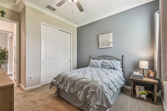 31840 Magna Gulf Loop, San Antonio, FL 33576 - bedroom with carpet flooring, a closet, crown molding, baseboards, and a ceiling fan