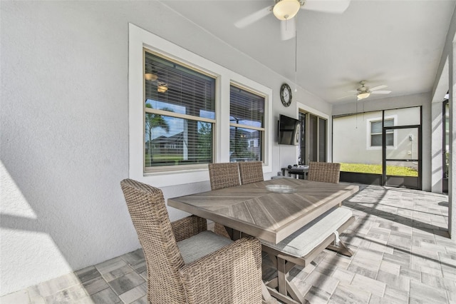 31840 Magna Gulf Loop, San Antonio, FL 33576 - sunroom with a ceiling fan and outdoor dining space