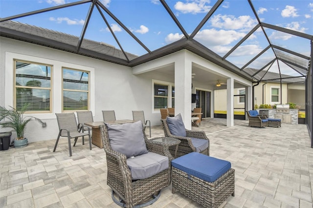31840 Magna Gulf Loop, San Antonio, FL 33576 - view of patio / terrace with area for grilling, a lanai, and a ceiling fan