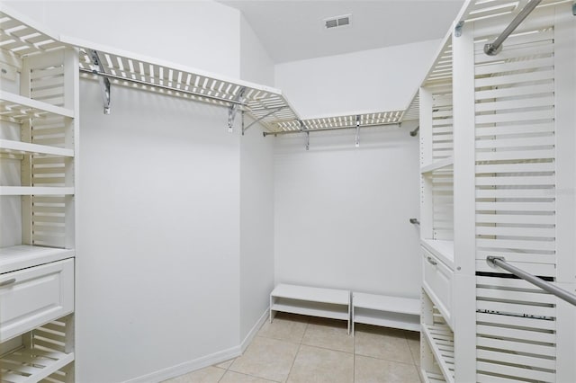 14848 Bonnybridge Dr, Orlando, FL 32826 - spacious closet featuring light tile patterned floors
