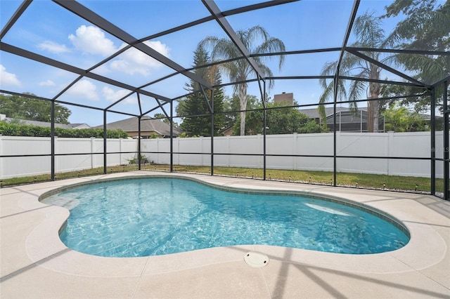 14848 Bonnybridge Dr, Orlando, FL 32826 - view of swimming pool featuring fence, a patio, and glass enclosure