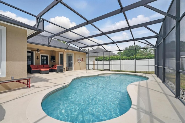 14848 Bonnybridge Dr, Orlando, FL 32826 - view of swimming pool with an outdoor hangout area, a patio area, a ceiling fan, and glass enclosure