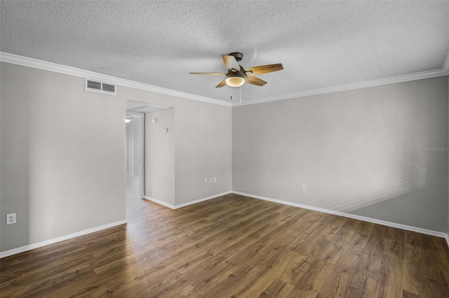 empty room with a ceiling fan, wood finished floors, baseboards, a textured ceiling, and crown molding