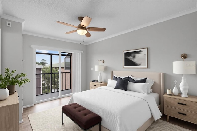 bedroom featuring access to outside, crown molding, light wood finished floors, baseboards, and a ceiling fan