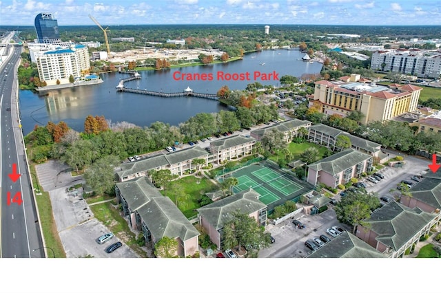 view of urban area with a large body of water