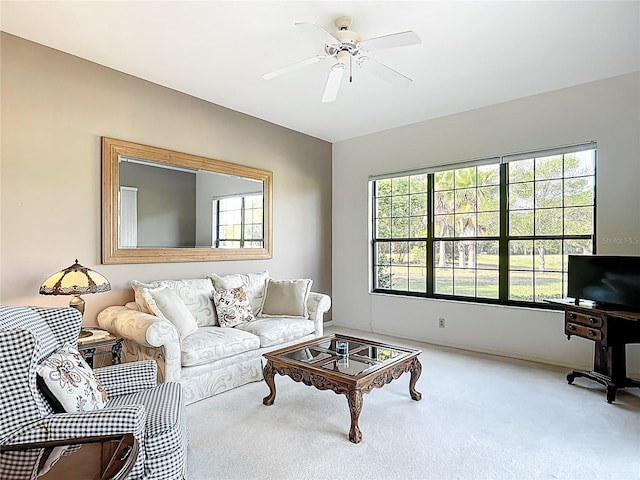 502 Canopy Ln, Lady Lake, FL 32159 - carpeted living room featuring a ceiling fan