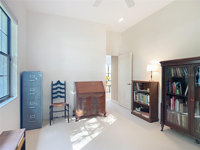 502 Canopy Ln, Lady Lake, FL 32159 - sitting room featuring carpet floors and ceiling fan
