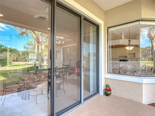 502 Canopy Ln, Lady Lake, FL 32159 - property entrance featuring stucco siding and a sink