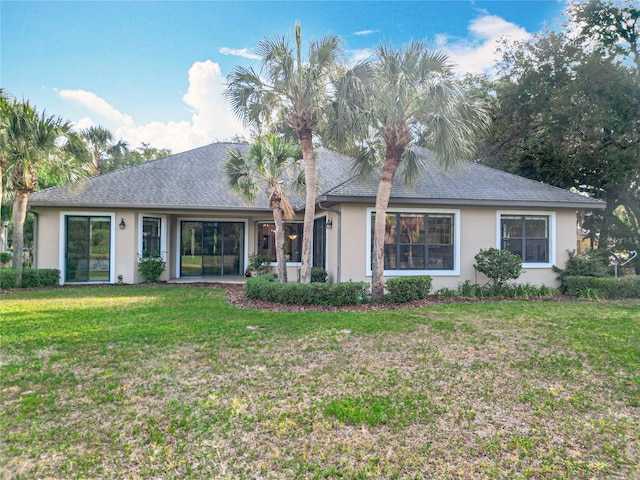 502 Canopy Ln, Lady Lake, FL 32159 - ranch-style home featuring stucco siding and a front lawn