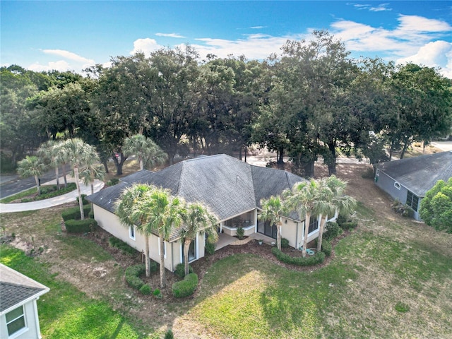 502 Canopy Ln, Lady Lake, FL 32159 - aerial view of property and surrounding area with a tree filled landscape