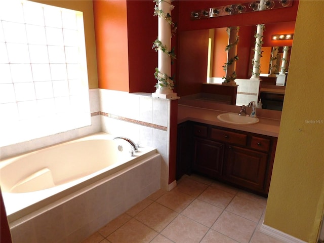 7045 Branch Ct, Saint Cloud, FL 34771 - full bathroom with tile patterned floors, a bath, and vanity