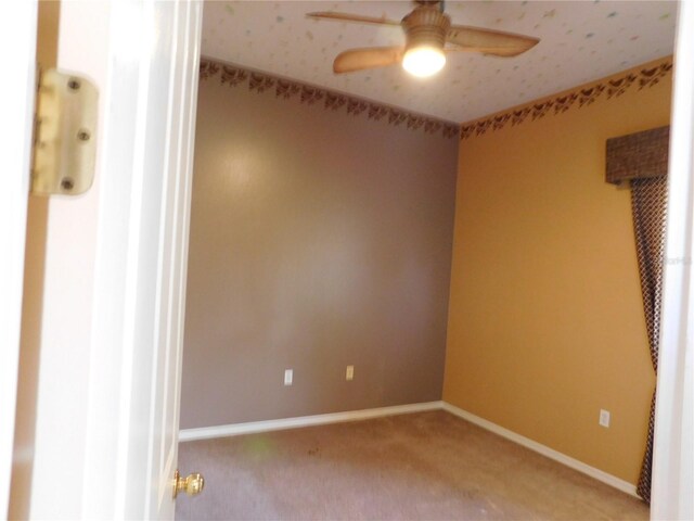 7045 Branch Ct, Saint Cloud, FL 34771 - spare room with ceiling fan, light colored carpet, and baseboards