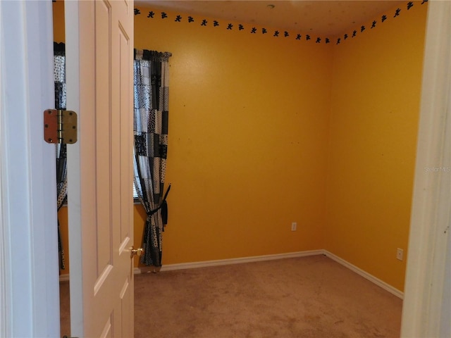 7045 Branch Ct, Saint Cloud, FL 34771 - unfurnished room with light colored carpet and baseboards