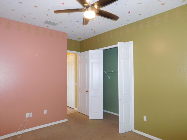 7045 Branch Ct, Saint Cloud, FL 34771 - unfurnished bedroom with carpet, baseboards, and a closet