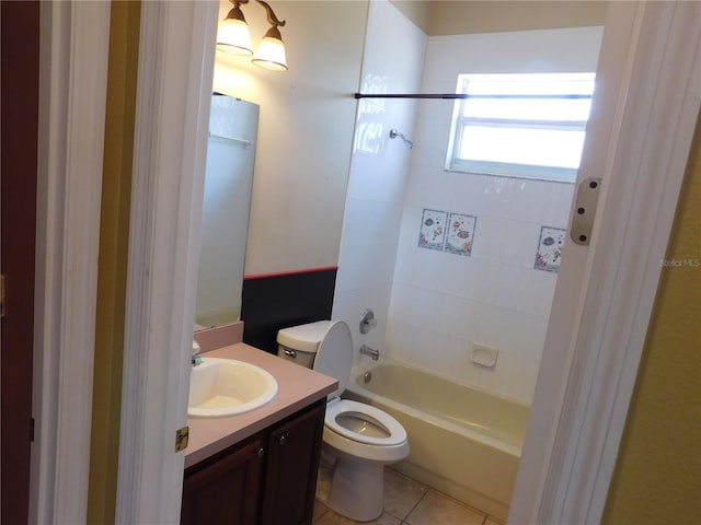 7045 Branch Ct, Saint Cloud, FL 34771 - full bath featuring toilet, vanity, tub / shower combination, and tile patterned floors
