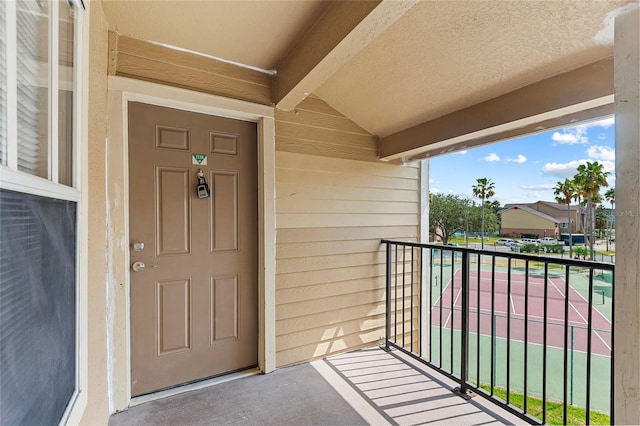 2213 Grand Cayman Ct Unit 1138, Kissimmee, FL 34741 - view of exterior entry featuring a balcony