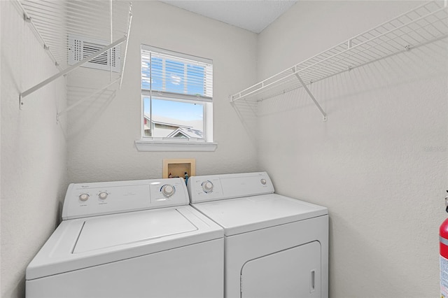 2213 Grand Cayman Ct Unit 1138, Kissimmee, FL 34741 - washroom with washer and dryer