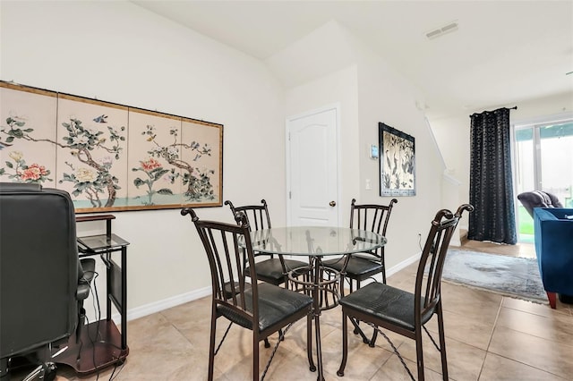1401 Yellow Finch Dr, Davenport, FL 33837 - dining space featuring light tile patterned flooring and baseboards