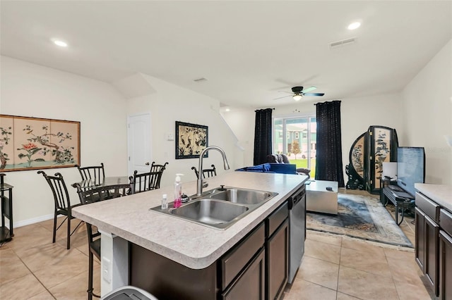 1401 Yellow Finch Dr, Davenport, FL 33837 - kitchen with a sink, light tile patterned floors, ceiling fan, light countertops, and recessed lighting