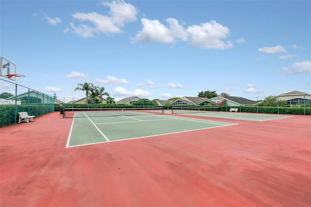 1401 Yellow Finch Dr, Davenport, FL 33837 - view of tennis court featuring community basketball court