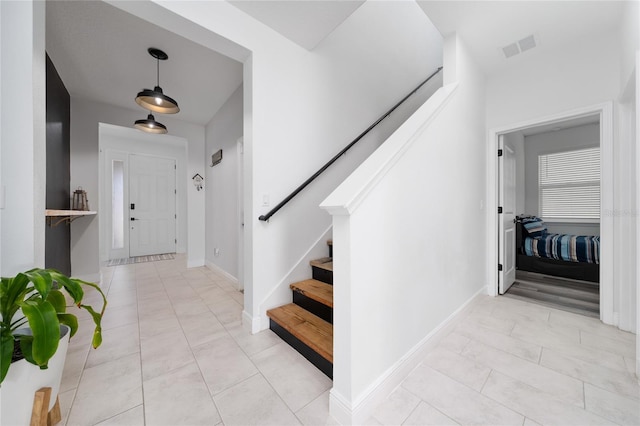 2591 Seagirt Way, Clermont, FL 34711 - foyer entrance with stairs and baseboards