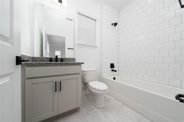 2591 Seagirt Way, Clermont, FL 34711 - full bath featuring toilet, vanity, bathtub / shower combination, and tile patterned flooring