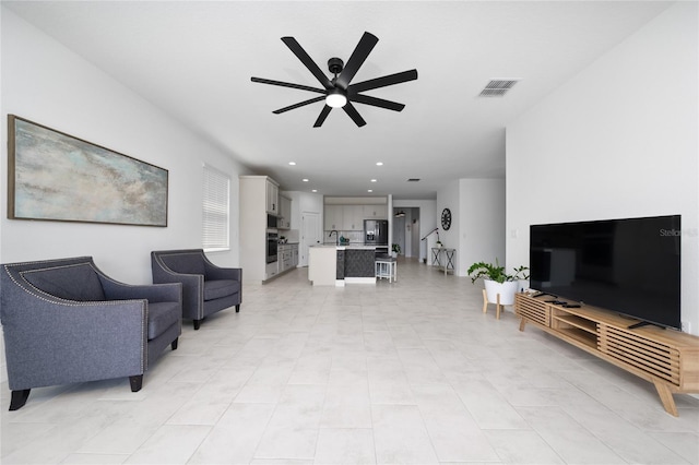 2591 Seagirt Way, Clermont, FL 34711 - living room with a ceiling fan and recessed lighting