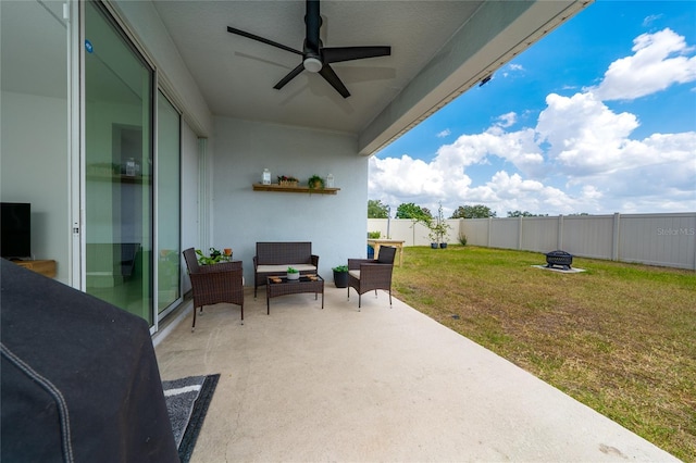 2591 Seagirt Way, Clermont, FL 34711 - view of patio / terrace featuring ceiling fan and an outdoor living space with a fire pit
