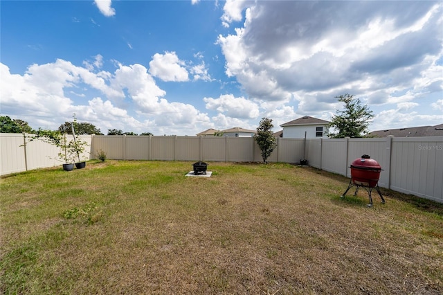 2591 Seagirt Way, Clermont, FL 34711 - view of yard featuring an outdoor fire pit