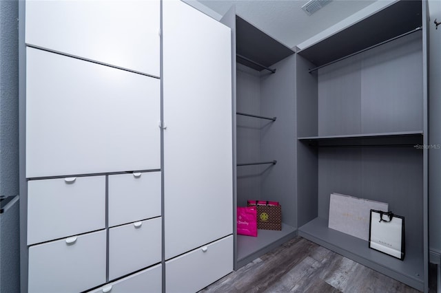 2591 Seagirt Way, Clermont, FL 34711 - walk in closet with wood finished floors
