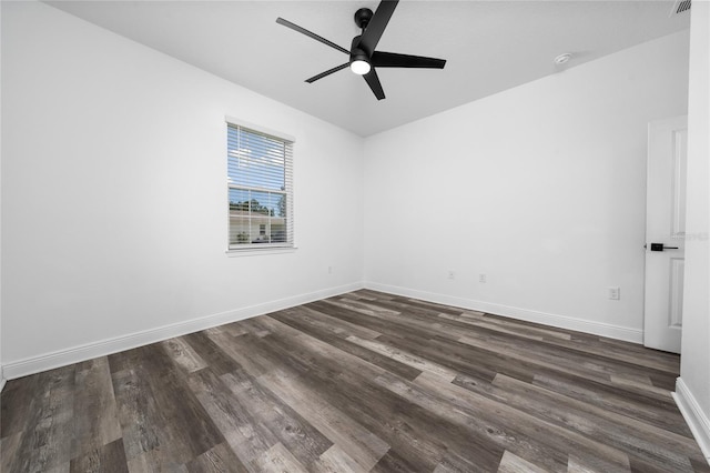 2591 Seagirt Way, Clermont, FL 34711 - empty room with dark wood-style floors, a ceiling fan, and a smoke detector