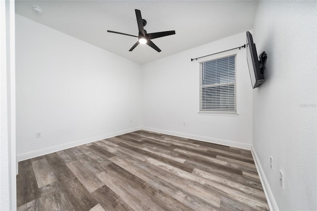 2591 Seagirt Way, Clermont, FL 34711 - unfurnished room with wood finished floors, ceiling fan, and a smoke detector