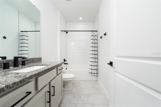 2591 Seagirt Way, Clermont, FL 34711 - bathroom with vanity, shower / bath combo with shower curtain, marble look tiles, and recessed lighting